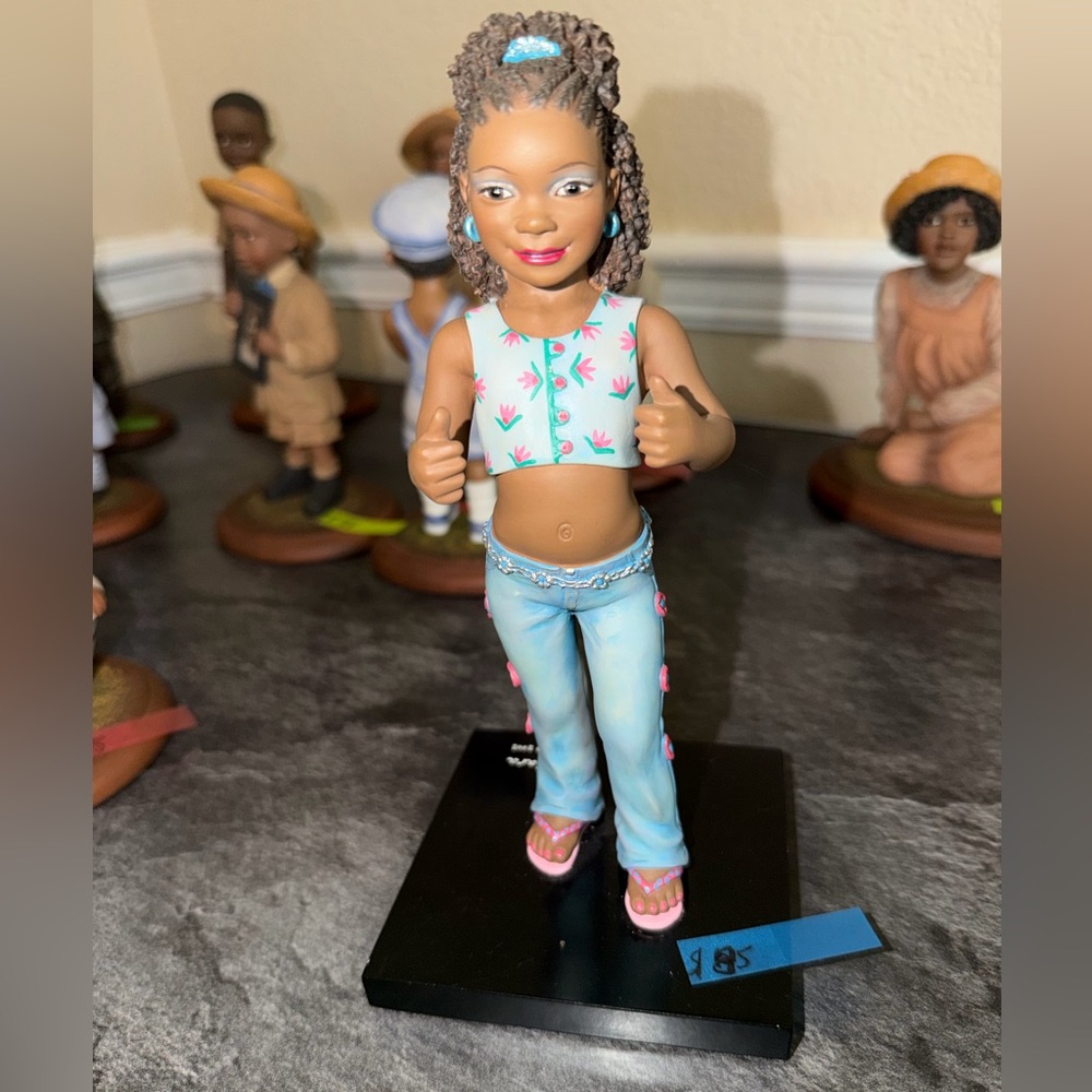 Charming Art Sculpture with Blue and Pink Outfit